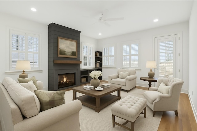 674B Westboro Dr, Nashville, TN 37209 - living area featuring light wood-style floors, healthy amount of natural light, ceiling fan, recessed lighting, and baseboards
