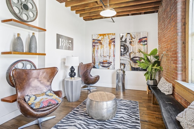 612 21st Ave N Unit 211, Nashville, TN 37203 - living area featuring wood finished floors, beam ceiling, and baseboards