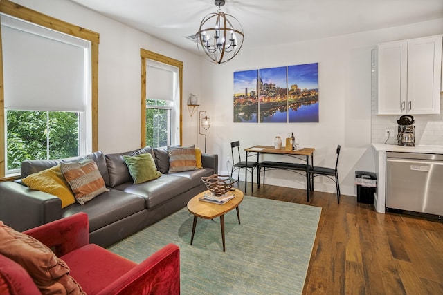 612 21st Ave N Unit 211, Nashville, TN 37203 - living area featuring a chandelier, dark wood finished floors, and plenty of natural light