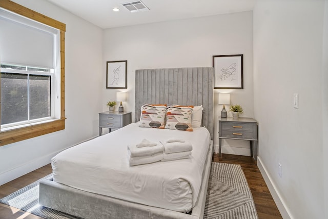 612 21st Ave N Unit 211, Nashville, TN 37203 - bedroom with wood finished floors, baseboards, and recessed lighting