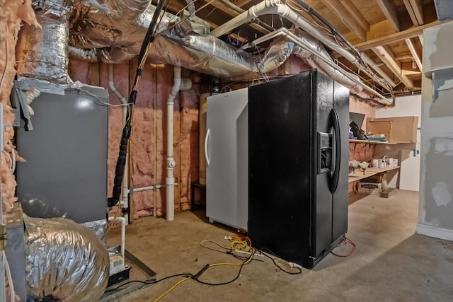 7244 Knottingham Dr, Fairview, TN 37062 - unfinished basement featuring black fridge