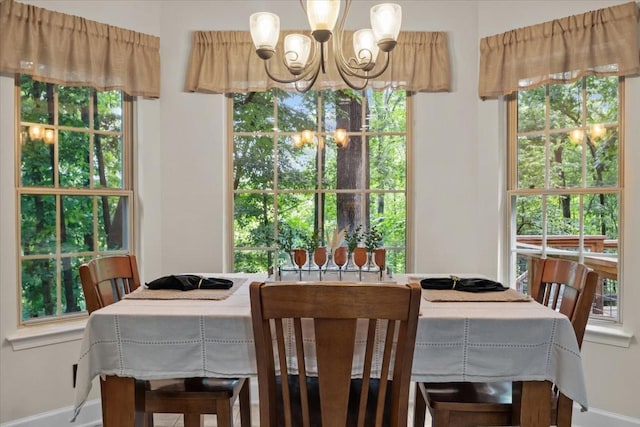 7244 Knottingham Dr, Fairview, TN 37062 - dining room featuring a chandelier and baseboards