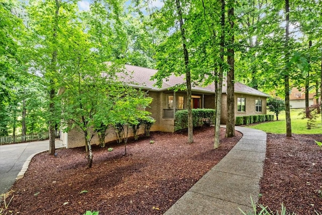 7244 Knottingham Dr, Fairview, TN 37062 - view of front of house featuring a shingled roof and stucco siding