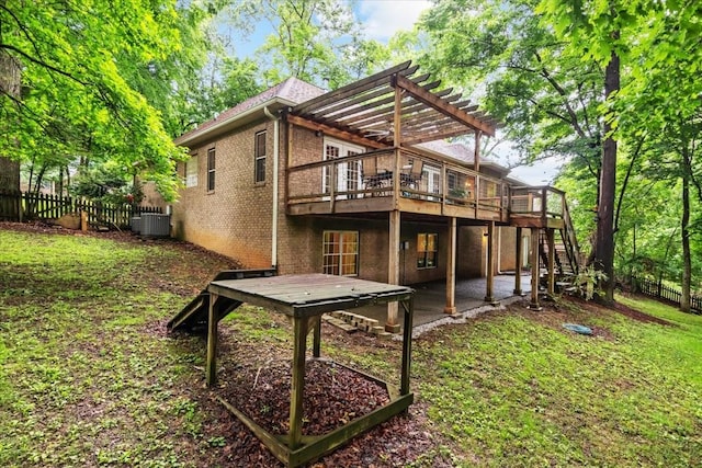7244 Knottingham Dr, Fairview, TN 37062 - back of house with a pergola, a wooden deck, central AC unit, a patio, and brick siding
