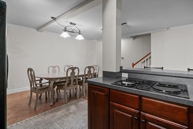 7244 Knottingham Dr, Fairview, TN 37062 - kitchen with light tile patterned floors, black appliances, dark countertops, and crown molding