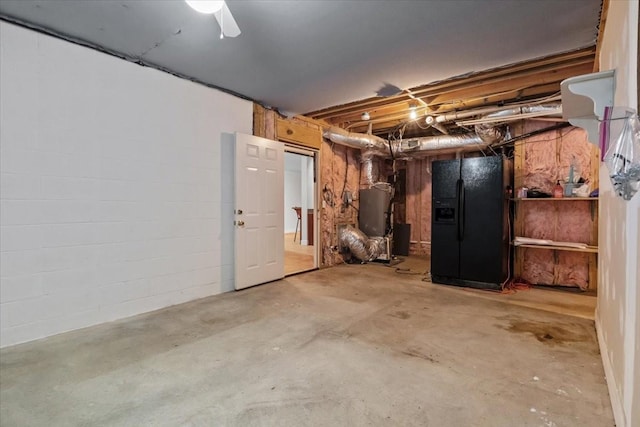 7244 Knottingham Dr, Fairview, TN 37062 - unfinished below grade area featuring black refrigerator with ice dispenser
