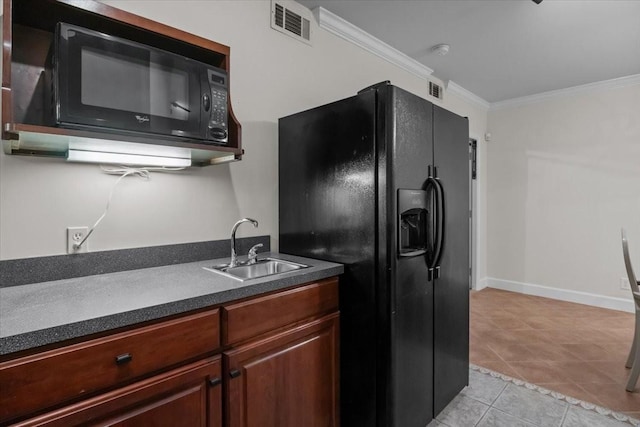 7244 Knottingham Dr, Fairview, TN 37062 - kitchen featuring black appliances, a sink, dark countertops, ornamental molding, and light tile patterned floors