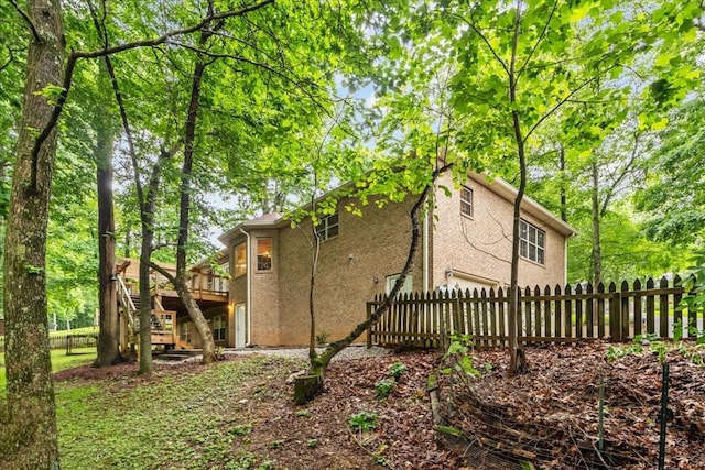 7244 Knottingham Dr, Fairview, TN 37062 - view of side of home featuring a deck, stairs, and a garage