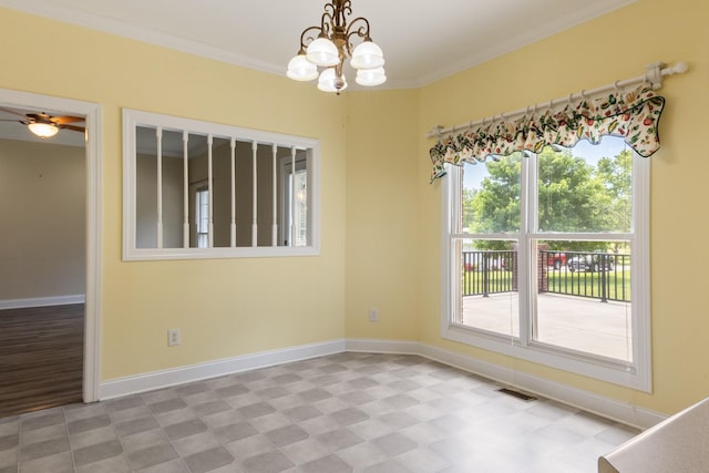 318 Tulip Tree Trl, Estill Springs, TN 37330 - spare room with a chandelier, crown molding, light flooring, and a ceiling fan