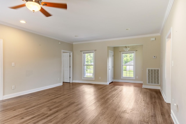 318 Tulip Tree Trl, Estill Springs, TN 37330 - empty room featuring wood finished floors, ornamental molding, and ceiling fan
