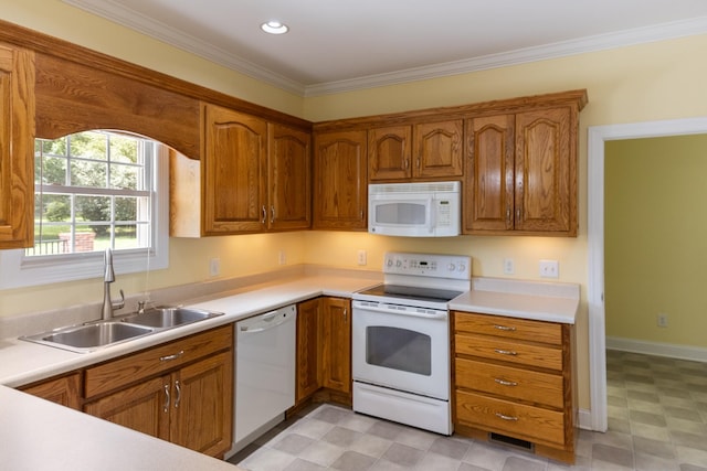 318 Tulip Tree Trl, Estill Springs, TN 37330 - kitchen with white appliances, brown cabinets, light floors, light countertops, and crown molding