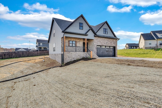 2600 Spring Arbor Ct, Cookeville, TN 38501 - view of front of property with a porch, driveway, a garage, and brick siding