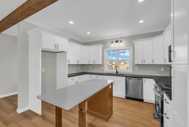 2600 Spring Arbor Ct, Cookeville, TN 38501 - kitchen with appliances with stainless steel finishes, a sink, light wood-style floors, white cabinets, and recessed lighting