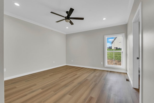 2600 Spring Arbor Ct, Cookeville, TN 38501 - spare room with ornamental molding, wood finished floors, baseboards, ceiling fan, and recessed lighting