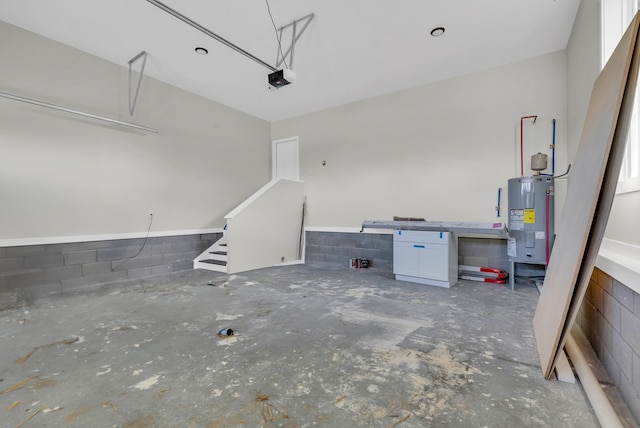 2600 Spring Arbor Ct, Cookeville, TN 38501 - garage featuring electric water heater and a garage door opener