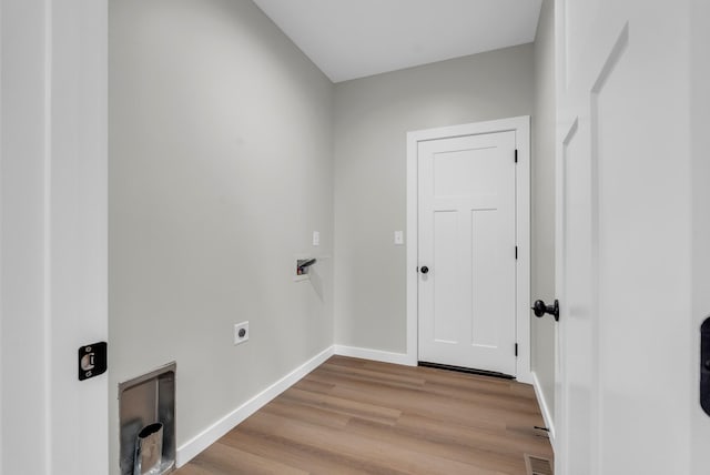 2600 Spring Arbor Ct, Cookeville, TN 38501 - washroom featuring washer hookup, light wood-style flooring, baseboards, and hookup for an electric dryer