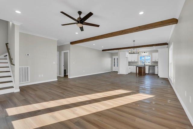 2600 Spring Arbor Ct, Cookeville, TN 38501 - unfurnished living room featuring ceiling fan, stairs, wood finished floors, a chandelier, and recessed lighting