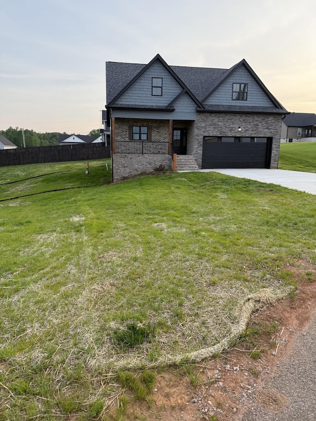 2600 Spring Arbor Ct, Cookeville, TN 38501 - view of front facade with driveway, a porch, brick siding, and a shingled roof