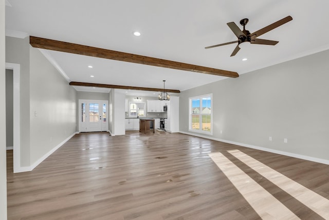 2600 Spring Arbor Ct, Cookeville, TN 38501 - unfurnished living room featuring baseboards, light wood finished floors, a ceiling fan, beamed ceiling, and recessed lighting