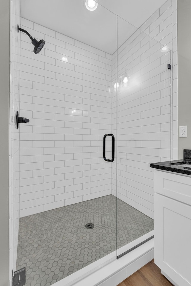 2600 Spring Arbor Ct, Cookeville, TN 38501 - full bath with a stall shower, vanity, and wood finished floors