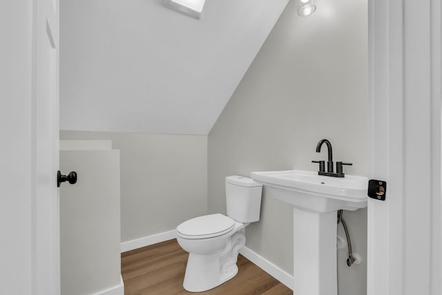 2600 Spring Arbor Ct, Cookeville, TN 38501 - half bath featuring toilet, wood finished floors, baseboards, and lofted ceiling