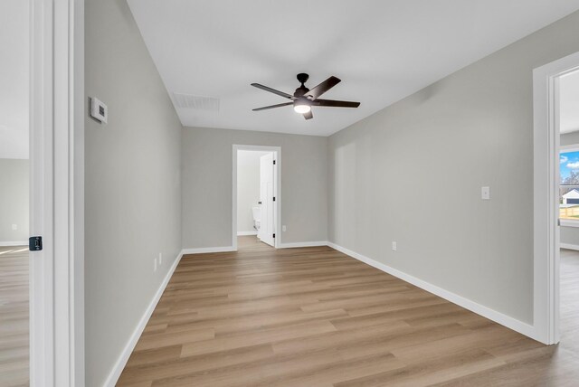 2600 Spring Arbor Ct, Cookeville, TN 38501 - empty room featuring a ceiling fan, light wood-style flooring, and baseboards
