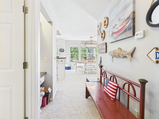 21 Heron Pt, Cadiz, KY 42211 - corridor with carpet, a chandelier, and baseboards