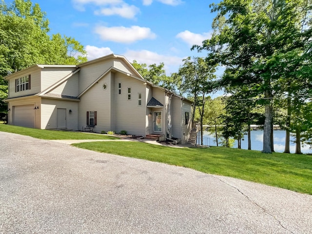 21 Heron Pt, Cadiz, KY 42211 - view of front facade featuring a garage, a front lawn, and entry steps