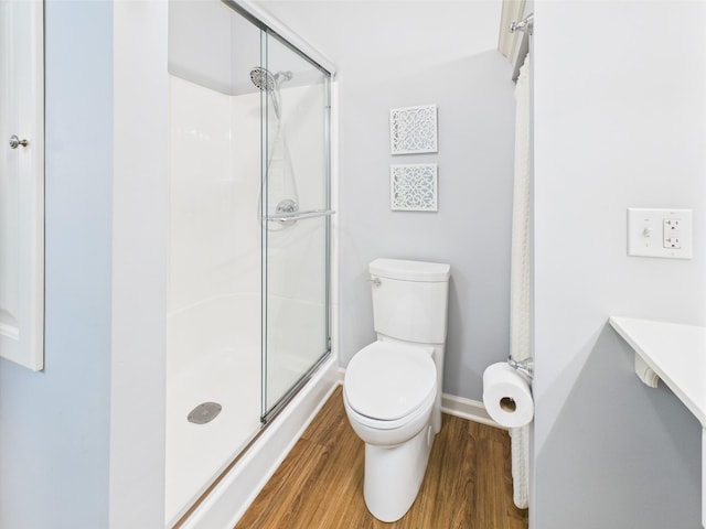 21 Heron Pt, Cadiz, KY 42211 - full bath with toilet, wood finished floors, baseboards, and a stall shower