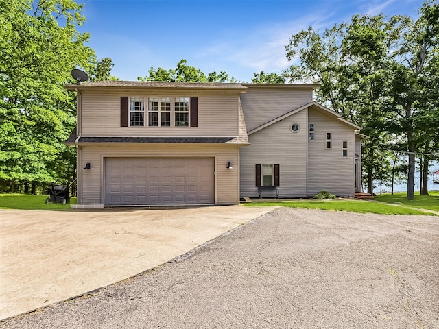 21 Heron Pt, Cadiz, KY 42211 - view of front facade featuring concrete driveway and an attached garage