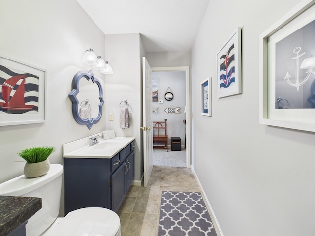 21 Heron Pt, Cadiz, KY 42211 - bathroom with vanity, toilet, and baseboards