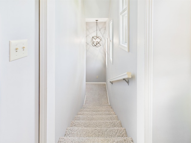 21 Heron Pt, Cadiz, KY 42211 - stairway featuring a chandelier, carpet flooring, and baseboards