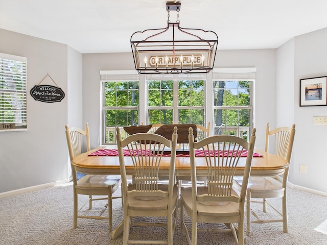 21 Heron Pt, Cadiz, KY 42211 - dining room featuring carpet flooring, baseboards, and a chandelier