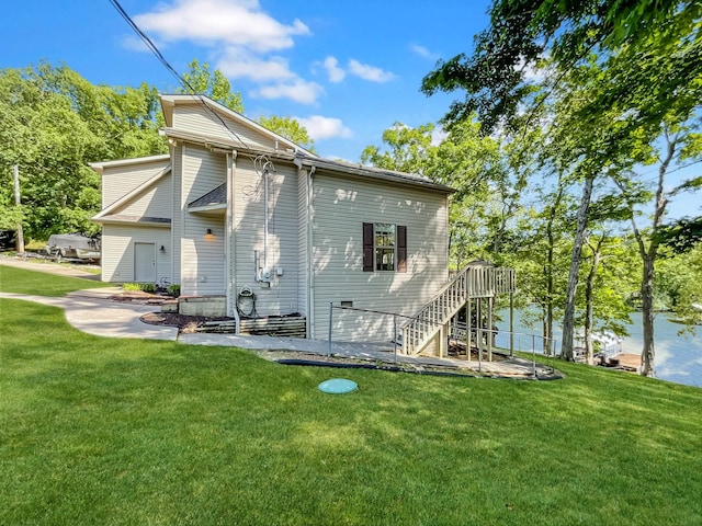 21 Heron Pt, Cadiz, KY 42211 - rear view of property with a lawn, stairs, and a water view