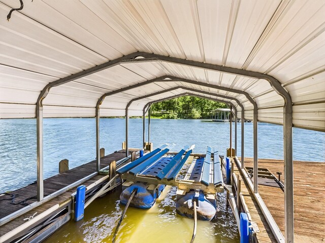 21 Heron Pt, Cadiz, KY 42211 - dock featuring boat lift and a water view