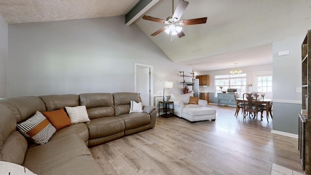 3507 Watts Ln, Murfreesboro, TN 37127 - living area featuring light wood finished floors, ceiling fan, beam ceiling, a chandelier, and high vaulted ceiling