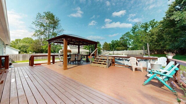 3507 Watts Ln, Murfreesboro, TN 37127 - wooden terrace with a gazebo, outdoor dining space, and a fenced backyard
