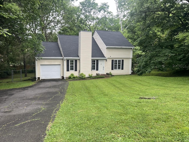 7214 Mark Dr, Nashville, TN 37221 - view of front of property with an attached garage, driveway, and a chimney