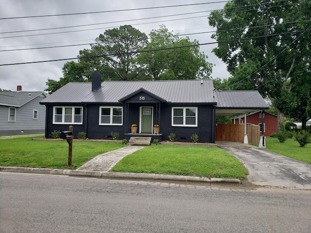 515 S Cedar Ln, Pulaski, TN 38478 - ranch-style house featuring metal roof, driveway, crawl space, and a carport