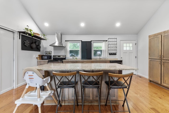 515 S Cedar Ln, Pulaski, TN 38478 - kitchen with wall chimney range hood, electric range, lofted ceiling, a center island, and black microwave