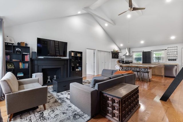 515 S Cedar Ln, Pulaski, TN 38478 - living area featuring a fireplace, light wood-style floors, high vaulted ceiling, a ceiling fan, and beam ceiling