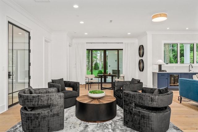 117 Alton Rd, Nashville, TN 37205 - living room featuring crown molding, light wood finished floors, and recessed lighting