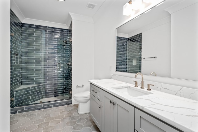 117 Alton Rd, Nashville, TN 37205 - bathroom with toilet, vanity, a shower stall, tile patterned floors, and crown molding