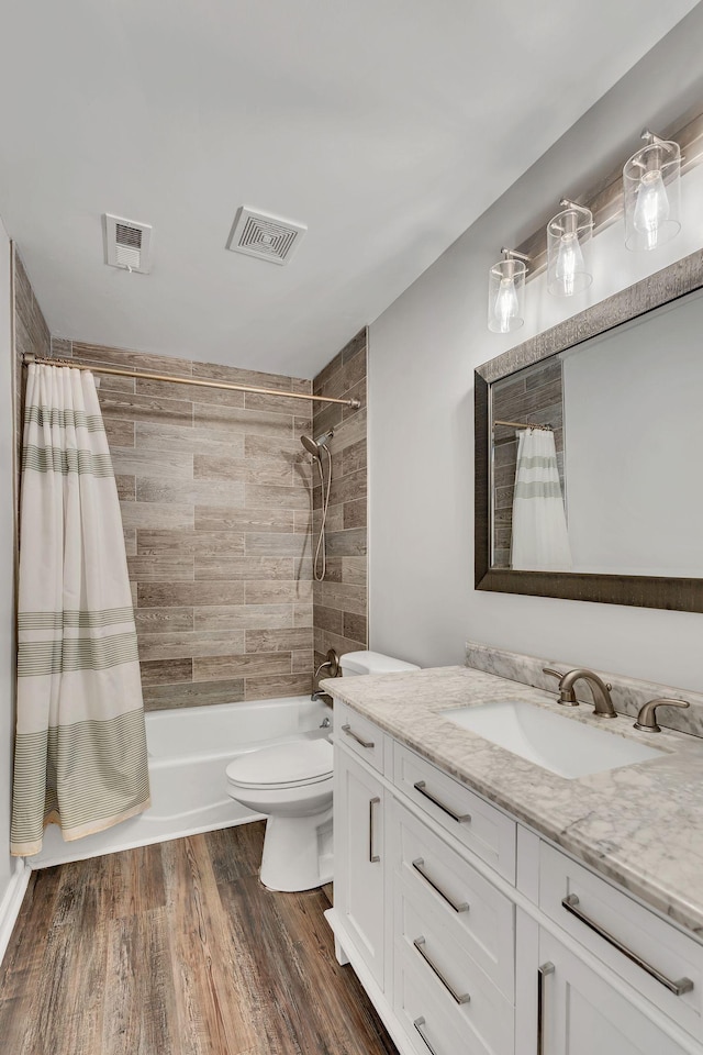 5839 Brentwood Trce, Brentwood, TN 37027 - full bath with vanity, shower / bathtub combination with curtain, toilet, and wood finished floors