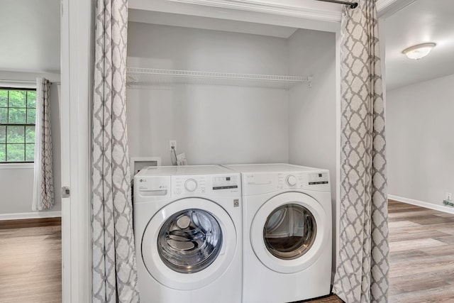 5839 Brentwood Trce, Brentwood, TN 37027 - washroom with washing machine and dryer, wood finished floors, and baseboards