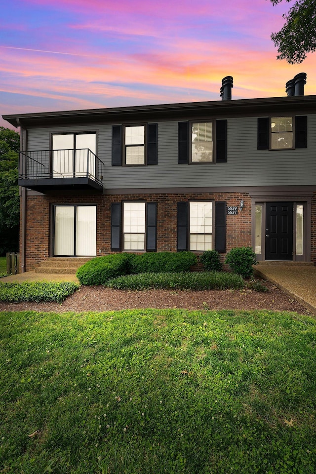 5839 Brentwood Trce, Brentwood, TN 37027 - townhome / multi-family property with a balcony, a yard, and brick siding