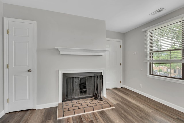 5839 Brentwood Trce, Brentwood, TN 37027 - unfurnished living room featuring baseboards, wood finished floors, and a fireplace with raised hearth