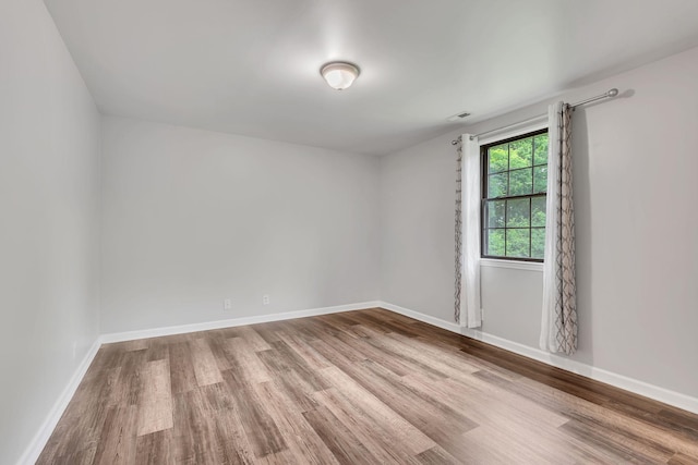 5839 Brentwood Trce, Brentwood, TN 37027 - unfurnished room with wood finished floors and baseboards