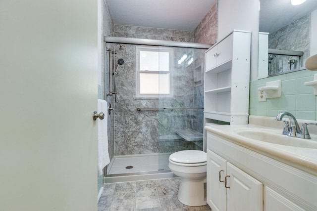 2023 Denise Dr, Columbia, TN 38401 - full bath with toilet, a shower stall, vanity, and marble look tiles