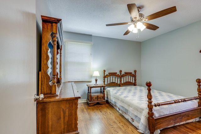 2023 Denise Dr, Columbia, TN 38401 - bedroom with wood finished floors, a ceiling fan, and baseboards